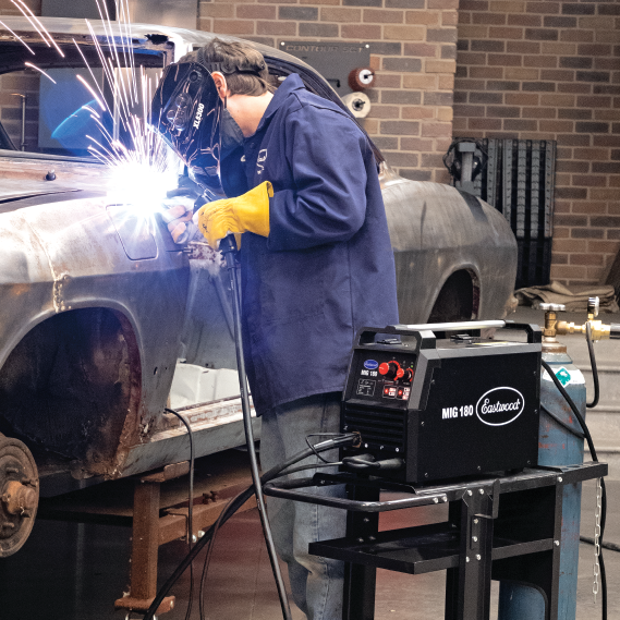 Using the MIG 180 to weld on a car.
